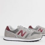 New Balance 373 trainers in grey and red